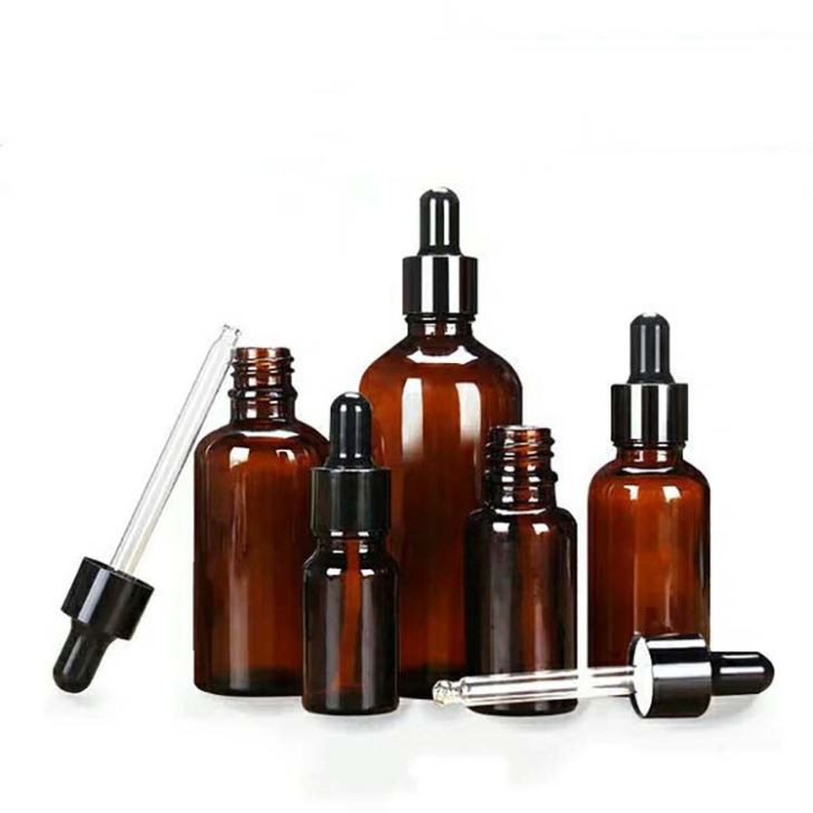 Black dropper with amber bottle
